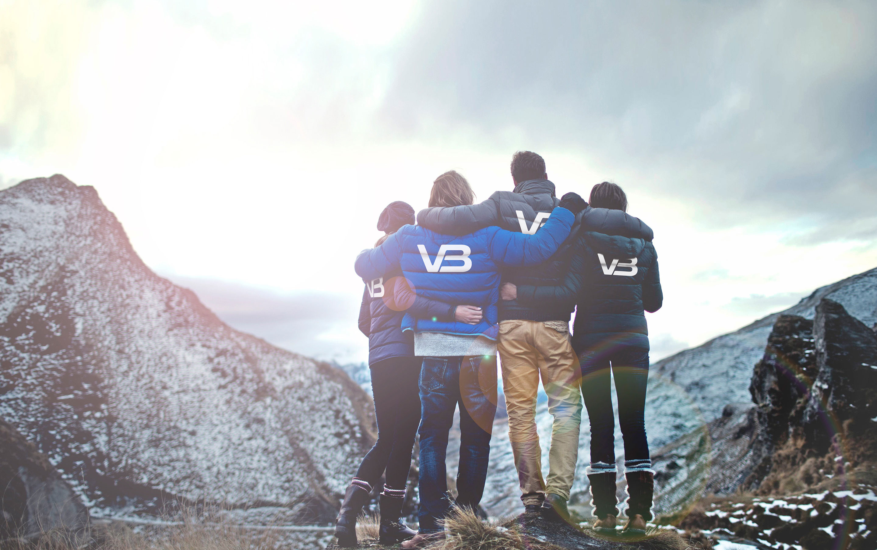 VB-rørleggere ser ut mot fjell i samlet flokk